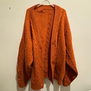 Taylor Swift: The Life of a Showgirl — Orange Cardigan